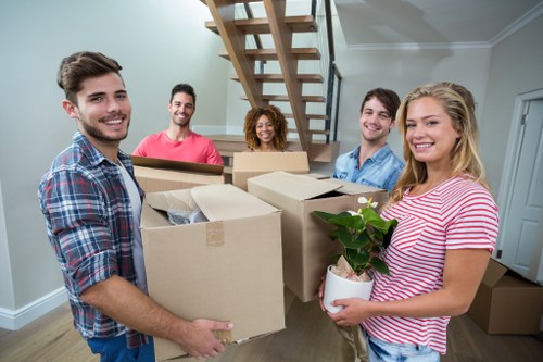 Removal company team helping with a move in Finchley