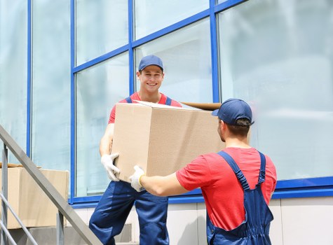 Office relocation with furniture and equipment being moved in Finchley