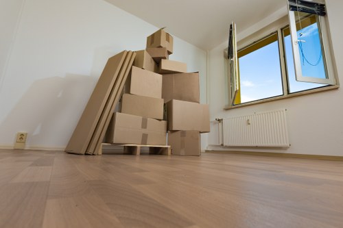 Family preparing belongings for a home move in Finchley