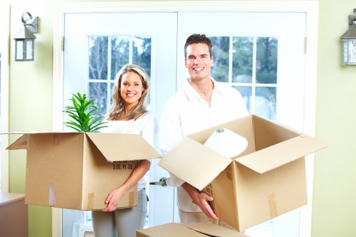 Furniture and boxes prepared for a student move in Finchley